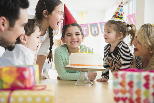 Caucasian family celebrating at birthday party