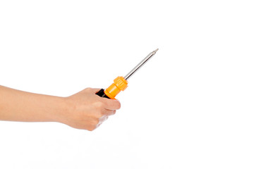 Hand holding screwdriver on white background, selective focus