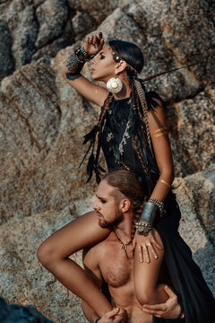 tribal man and woman outdoors