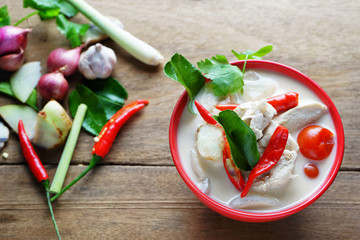Thai style coconut milk soup with chicken in red cup, (Tom Kha Gai ),select focus