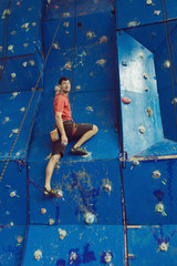 Fit man rock climbing