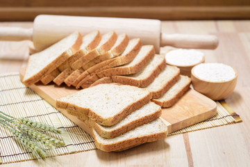 sliced bread on wooden table