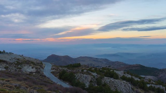sunset light mountain road to sierra nevada 4k time lapse spain
