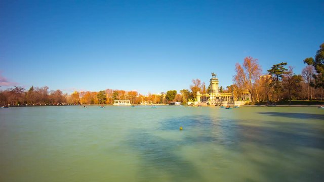 madrid sun light retiro park pond panoramic view 4k time lapse spain
