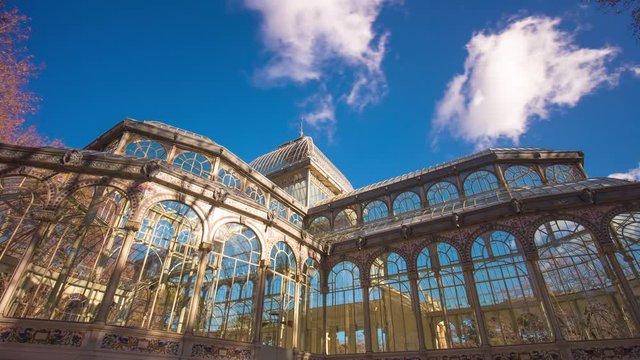 sunny day running clouds madrid palacio de cristal top 4k time lapse  spain
