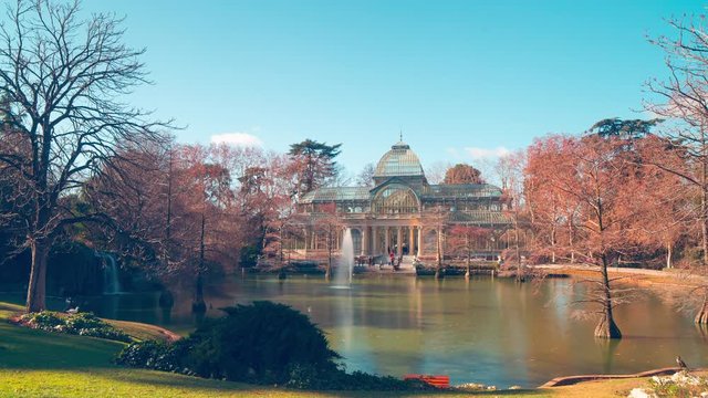 day madrid retiro park crystal palace pond panorama 4k time lapse spain
