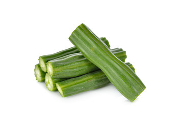 uncooked portion cut moringa on white background
