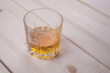 Whiskey on light wood
