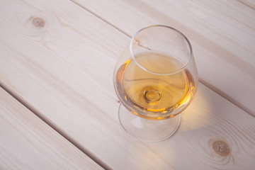 Brandy on light wood