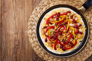Quesadilla with chicken, served with guacamole or salsa sauce.