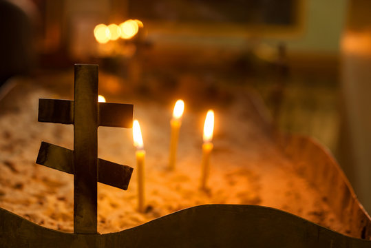 cross and candles in the church