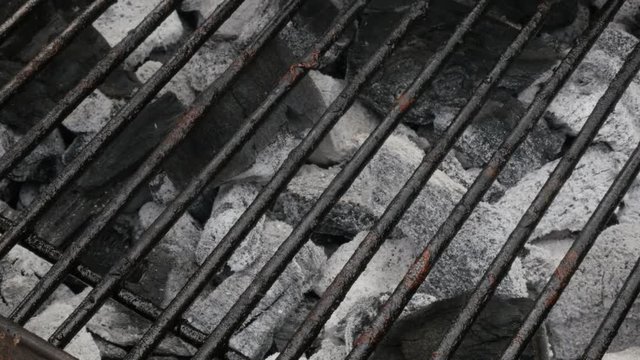 Skewers on barbecue taking from fire close-up 4K 3840X2160 UltraHD footage - Brochettes meat tasty meal smoked on fire and charcoal 4K 2160p UHD video 