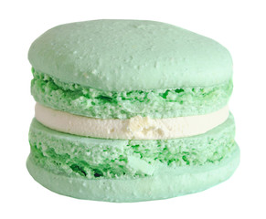 Green pistachio sweet macaroons, french traditional, cream,   white background.