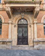vintage arched wooden door, entrance detail