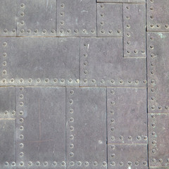 vintage metallic square pattern suface closeup