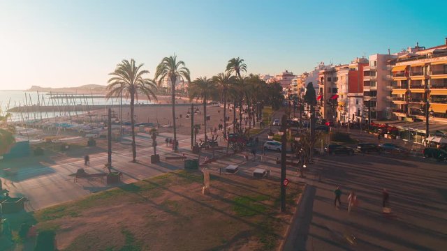 sitges sunset panoramic view on main tourist walking bay square 4k time lapse spain
