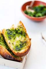 Garlic bread with wild garlic leaves