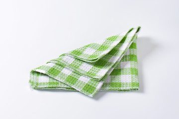 Green and white tea towel