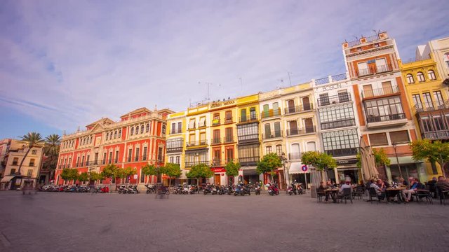 seville sunny day square panorama with scooter and cafe 4k time lapse spain
