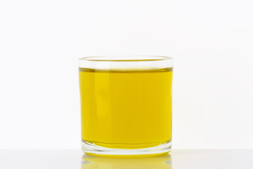 Glass of olive oil