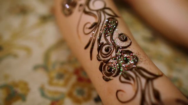 Mehndi. Henna pattern on model's foot