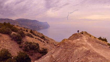 People on a cliff