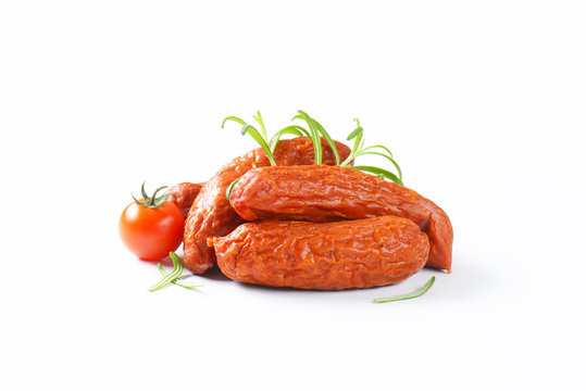 Kielbasa sausages on white background