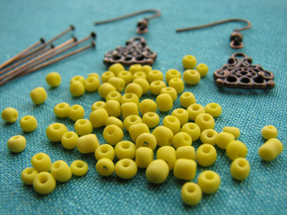Yellow beads and pieces for making earrings, handmade jewelry