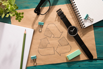 Green energy concept - notepad with sketch on the desk