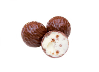 Praline filled chocolate cream on white background