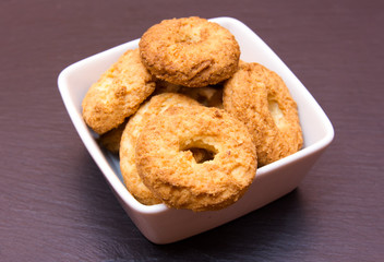 Cookies on a square bowl on slate top