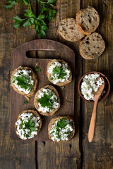 Curd cheese on bread, top view