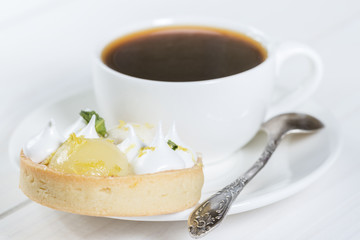 Lemon tart with coffee