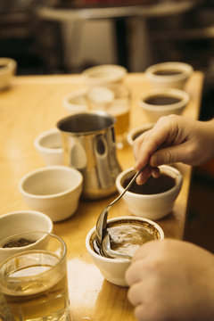 Man tasting coffee in coffee shop