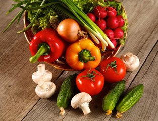 Vegetables . Fresh Bio Vegetable in a Basket. Over Nature Background