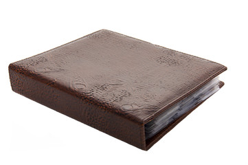 album for coins/Album for coins cover the skin brown crocodile on a white background