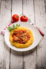 cod with tomato sauce and porridge