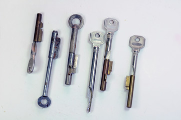 Collection of antique door keyhole blockers. They were put into a locked mortise lock, the brass part leaving in the hole to increase safety against burglary.