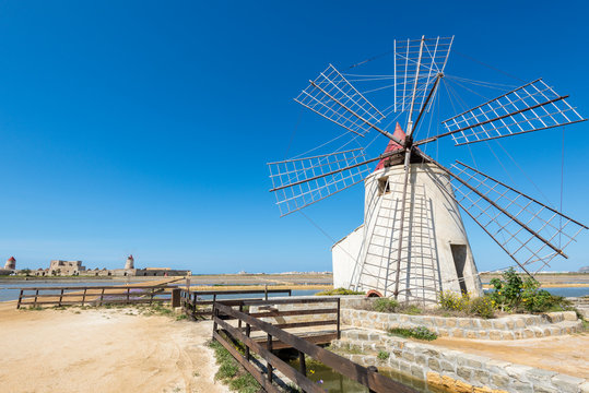 The salt flats with windmills of Trapani, Sicily (Italy)
