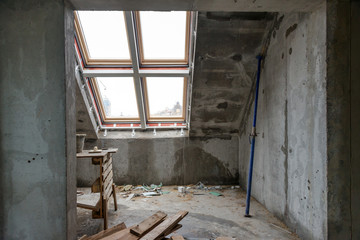 Rebuilding apartments. The room during renovation. Concrete interior. Development.