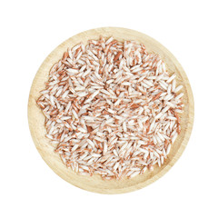 Brown rice in wooden bowl on white background