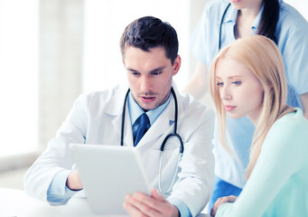 doctor and nurse with patient in hospital