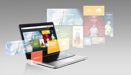 laptop with internet applications on screen