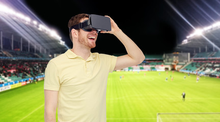 man in virtual reality headset over football field
