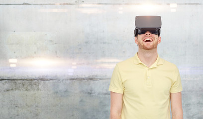 happy man in virtual reality headset or 3d glasses