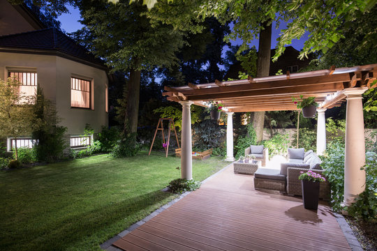 Garden with patio at night
