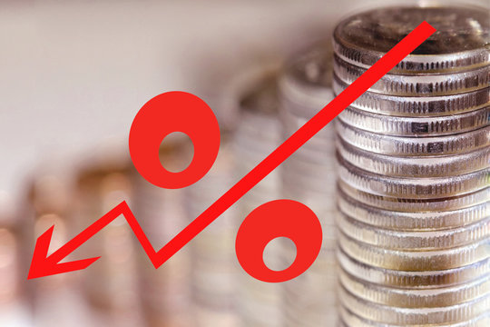 Red icon of interest on the background of coins