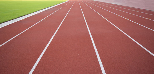 track running, Red treadmill in sport field. soft focus