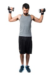 Fototapeta na wymiar Sportman doing weightlifting