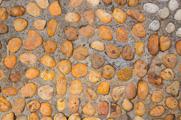 round river stone wall for background.